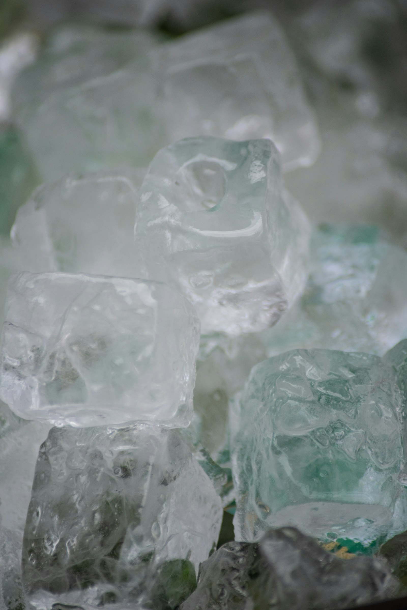 Close-up of ice cubes, illustrating ice slurry pre-cooling for hot-weather hydration